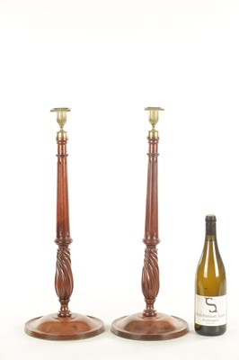 Lot 1198 - A LARGE PAIR OF GEORGE III STYLE TURNED MAHOGANY CANDLESTICKS