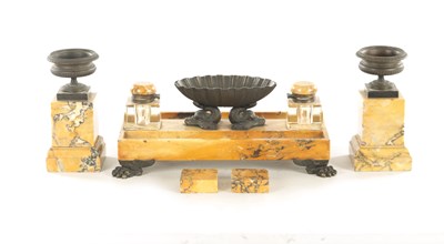 Lot 795 - A 19TH CENTURY ITALIAN BRONZE AND SIENNA MARBLE DESK SET COMPRISING OF AN INKSTAND, A PAIR OF TAZZAS AND A PAIR OF PAPERWEIGHTS