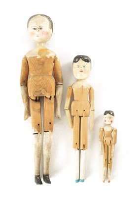 Lot 746 - THREE 19TH CENTURY PEG DOLLS