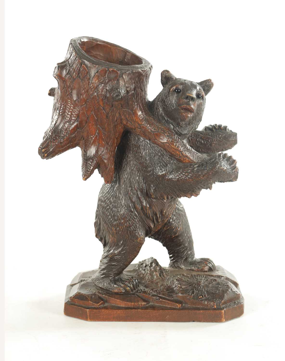 Lot 1155 - A 19TH CENTURY BLACK FOREST CARVED LINDEN WOOD BEAR DECANTER STAND