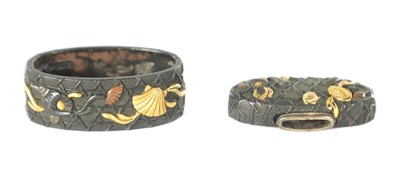 Lot 102 - A FINE EDO PERIOD JAPANESE MIXED METAL AND BRONZE FUCHI KASHIRA