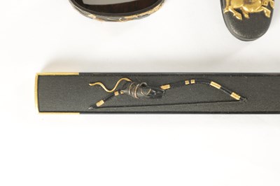 Lot 140 - A FINE EDO PERIOD JAPANESE MIXED METAL AND BRONZE FUCHI, KASHIRA AND KOZUKA
