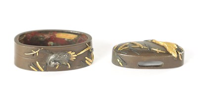 Lot 199 - A FINE EDO PERIOD JAPANESE MIXED METAL AND BRONZE FUCHI KASHIRA