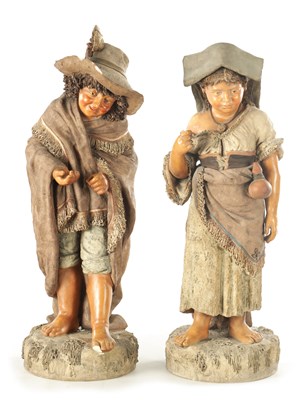 Lot 756 - A LARGE PAIR OF 19TH CENTURY POLYCHROME TERRACOTTA FIGURES