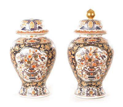 Lot 109 - A PAIR OF 19TH CENTURY STYLE IMARI VASES AND COVERS