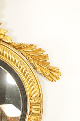 Lot 1414 - A GOOD REGENCY CARVED GILT-WOOD CONVEX HANGING MIRROR