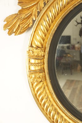 Lot 1414 - A GOOD REGENCY CARVED GILT-WOOD CONVEX HANGING MIRROR