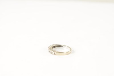 Lot 233 - A 9CT GOLD SEVEN STONE DIAMOND ETERNITY RING