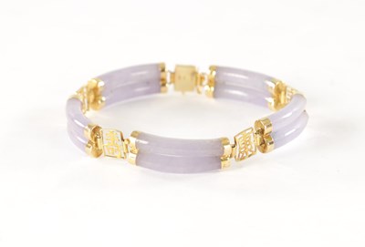 Lot 264 - A CHINESE 14CT GOLD LAVENDER JADE BRACELET