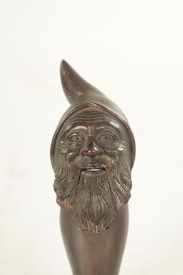 Lot 1193 - A LATE 19TH CENTURY BLACK FOREST CARVED NOVELTY NUT CRACKER