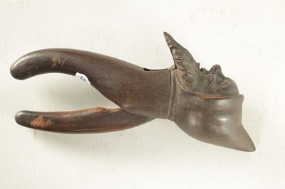 Lot 1193 - A LATE 19TH CENTURY BLACK FOREST CARVED NOVELTY NUT CRACKER