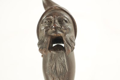 Lot 1193 - A LATE 19TH CENTURY BLACK FOREST CARVED NOVELTY NUT CRACKER