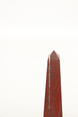 Lot 655 - A PAIR OF VEINED ROUGE MARBLE OBELISKS