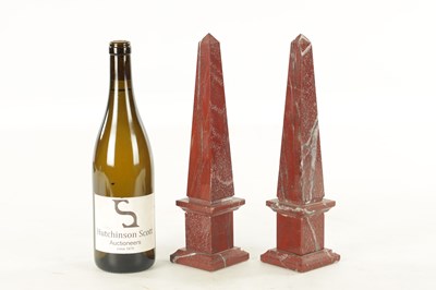 Lot 655 - A PAIR OF VEINED ROUGE MARBLE OBELISKS