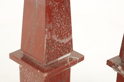 Lot 655 - A PAIR OF VEINED ROUGE MARBLE OBELISKS