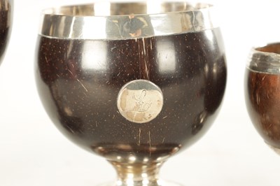 Lot 693 - A COLLECTION OF FOUR LATE GEORGIAN COCONUT GOBLETS