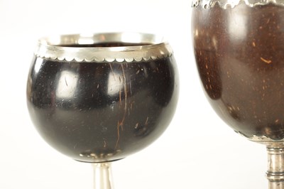 Lot 693 - A COLLECTION OF FOUR LATE GEORGIAN COCONUT GOBLETS