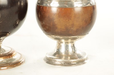 Lot 693 - A COLLECTION OF FOUR LATE GEORGIAN COCONUT GOBLETS