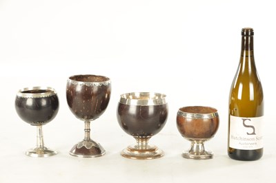 Lot 693 - A COLLECTION OF FOUR LATE GEORGIAN COCONUT GOBLETS