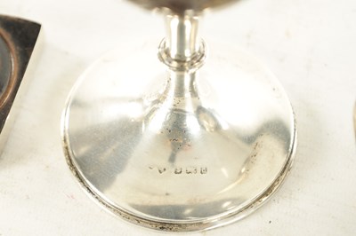 Lot 802 - TWO LATE GEORGIAN SILVER MOUNTED COCONUT GOBLETS