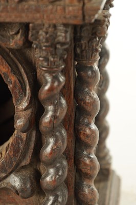 Lot 1137 - A 17TH/18TH CENTURY CARVED OAK CLOCK CASE