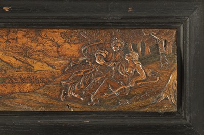 Lot 1199 - AN EARLY CONTINENTAL FINELY CARVED AND POLYCHROME FRAMED WOOD PANEL