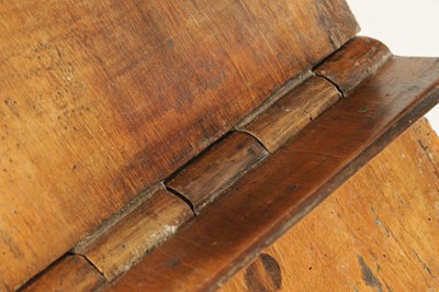 Lot 1180 - AN 18TH/19TH CENTURY CONTINENTAL WALNUT BOOKREST