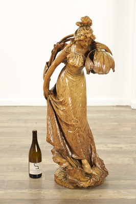 Lot 869 - A LARGE AUSTRIAN ART NOUVEAU FIGURAL TERRACOTTA LAMP