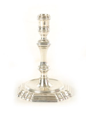 Lot 398 - A GEORGE I CAST SILVER TAPERSTICK