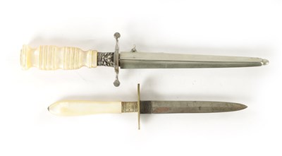 Lot 564 - TWO MOTHER OF PEARL HANDLED STILETTO DAGGERS