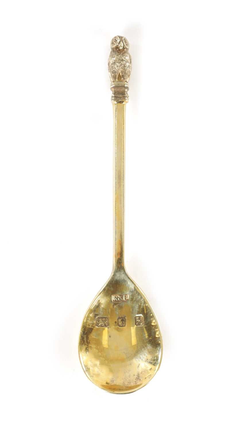 Lot 405 - AN ELIZABETH II SILVER GILT SPOON