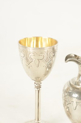 Lot 406 - A CASED VICTORIAN THREE-PIECE SILVER TRAVELLING COMMUNION SERVICE