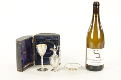 Lot 406 - A CASED VICTORIAN THREE-PIECE SILVER TRAVELLING COMMUNION SERVICE