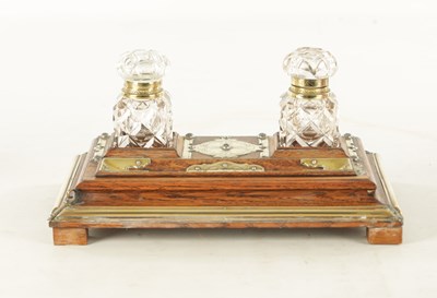 Lot 1223 - A LATE VICTORIAN STUDDED BRASS BOUND OAK DESK STAND