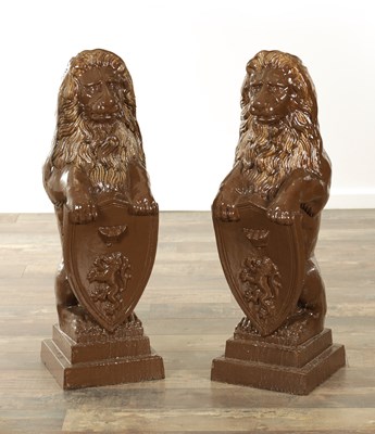 Lot 784 - A PAIR OF VICTORIAN PAINTED CAST IRON LIONS