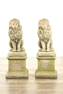 Lot 677 - A PAIR OF MODERN COMPOSITE STONE LIONS