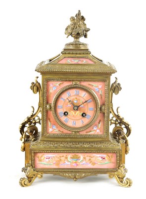 Lot 1128 - A LATE 19TH CENTURY FRENCH ORMOLU AND PORCELAIN PANELLED MANTEL CLOCK