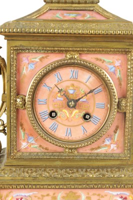 Lot 1128 - A LATE 19TH CENTURY FRENCH ORMOLU AND PORCELAIN PANELLED MANTEL CLOCK