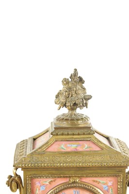 Lot 1128 - A LATE 19TH CENTURY FRENCH ORMOLU AND PORCELAIN PANELLED MANTEL CLOCK