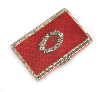 Lot 258 - AN ART DECO SILVER AND RED GUILLOCHE ENAMEL CIGARETTE CASE