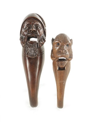 Lot 1171 - A 19TH CENTURY BLACK FOREST CARVEDWOOD NUTCRACKER AND ANOTHER