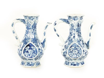 Lot 170 - A PAIR OF 19TH CENTURY CHINESE BLUE AND WHITE MINIATURE EWERS