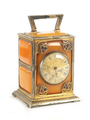 Lot 1109 - AN UNUSUAL FRENCH ART NOUVEAU SILVER GILT AND AMBER PANELLED FRENCH CARRIAGE TYPE MANTEL CLOCK