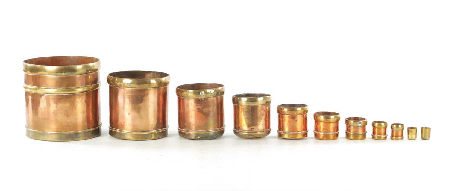 Lot 839 - A GRADUATED SET OF TEN INDIAN BRASS BOUND COPPER GRAIN MEASURES