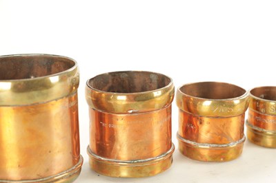 Lot 839 - A GRADUATED SET OF TEN INDIAN BRASS BOUND COPPER GRAIN MEASURES