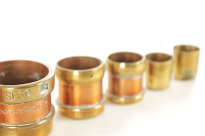 Lot 839 - A GRADUATED SET OF TEN INDIAN BRASS BOUND COPPER GRAIN MEASURES