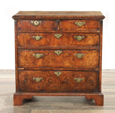 Lot 1356 - A GEORGE I WALNUT VENEERED CHEST OF DRAWERS