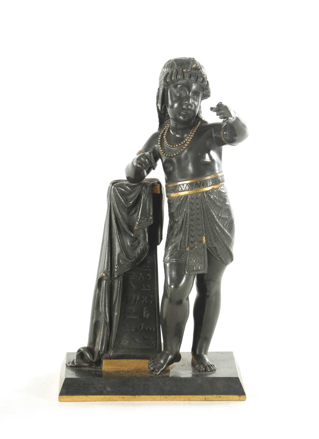 Lot 707 - A 19TH CENTURY BRONZE AND GILT HIGH-LIGHTED EGPTIANESQSE FIGURAL BRONZE