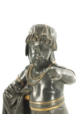 Lot 707 - A 19TH CENTURY BRONZE AND GILT HIGH-LIGHTED EGPTIANESQSE FIGURAL BRONZE