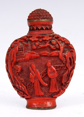 Lot 158 - A CHINESE CINNABAR SNUFF BOTTLE depicting...